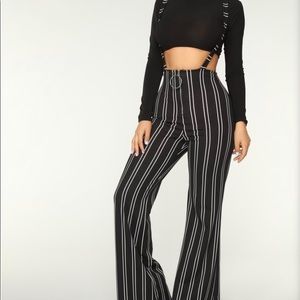 Black and with pinstripe flares